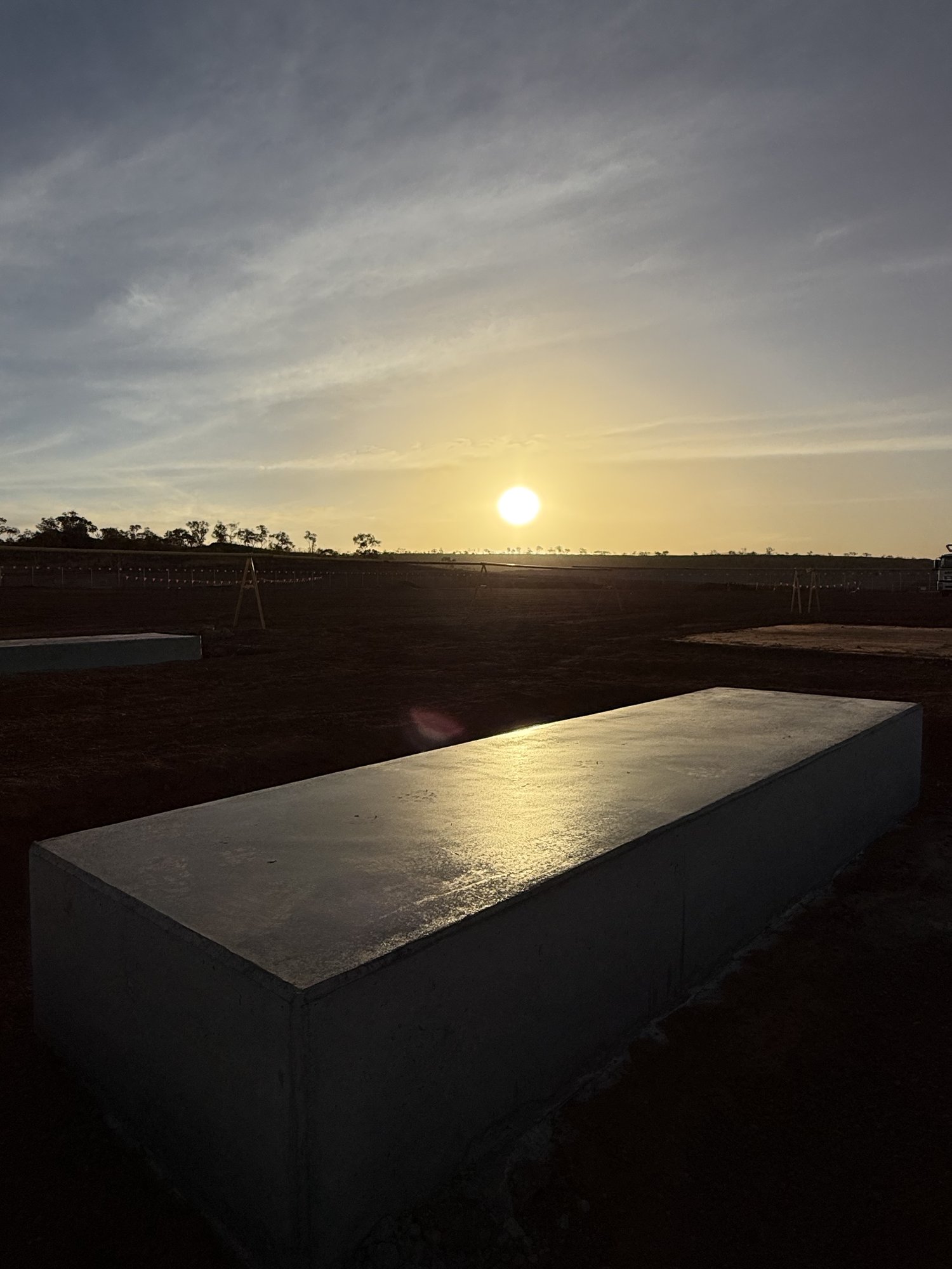 Finished concrete pad at golden hour
