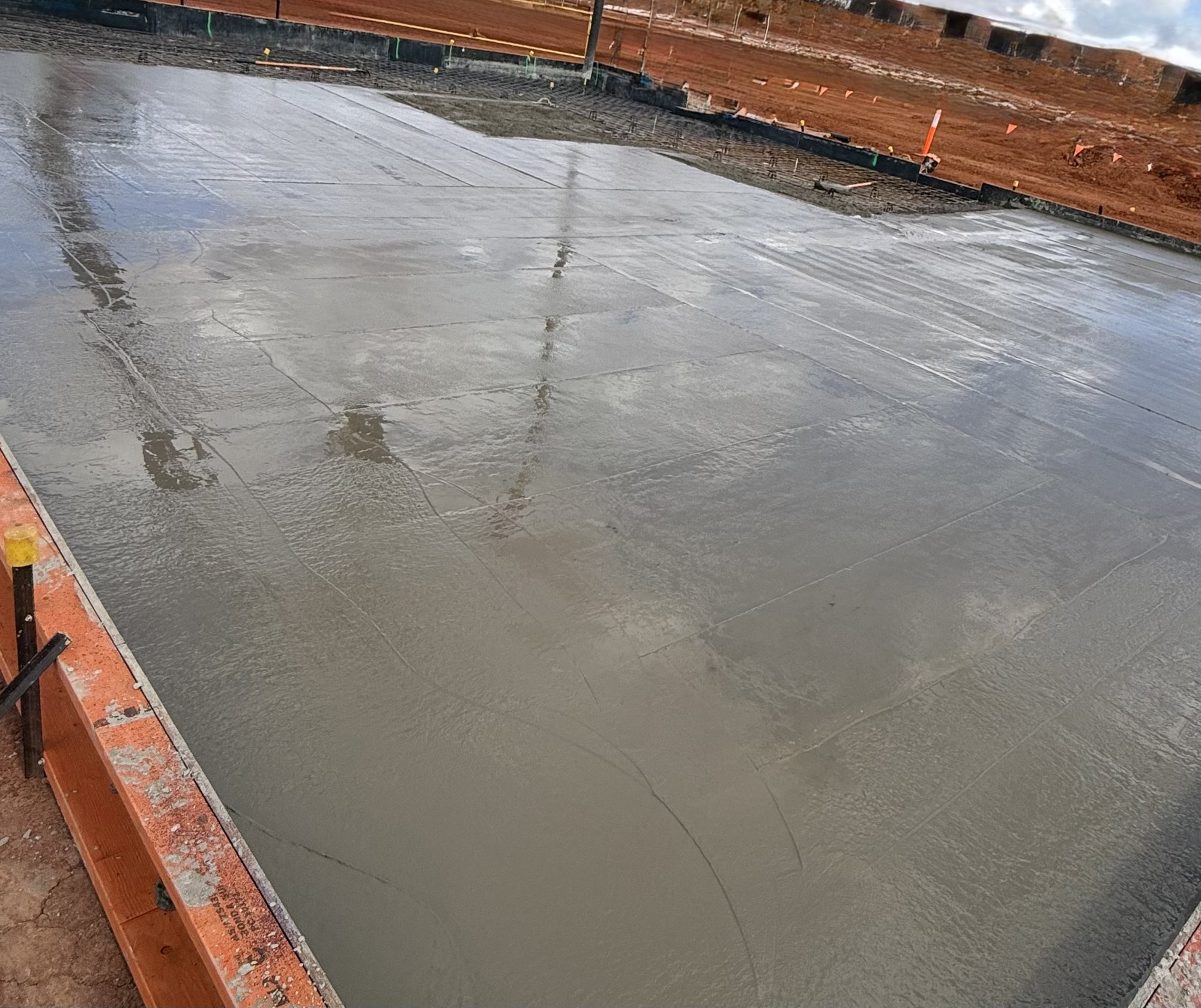 Large fresh-poured slab still wet on the surface